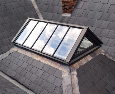 Photo of a bespoke gable-ended roof lantern over a stairwell