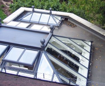 Made-to-measure rectangular lantern with central flat roof section