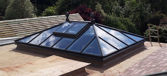 Photo of a Tuck's Wood roof lantern just after installation.  In the UK we employ our own installation specialists